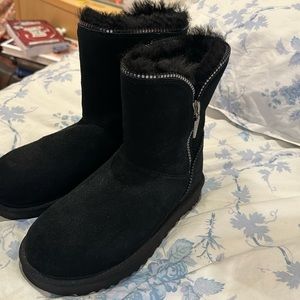 Worn once! Black Ugg boots with zipper detailing.